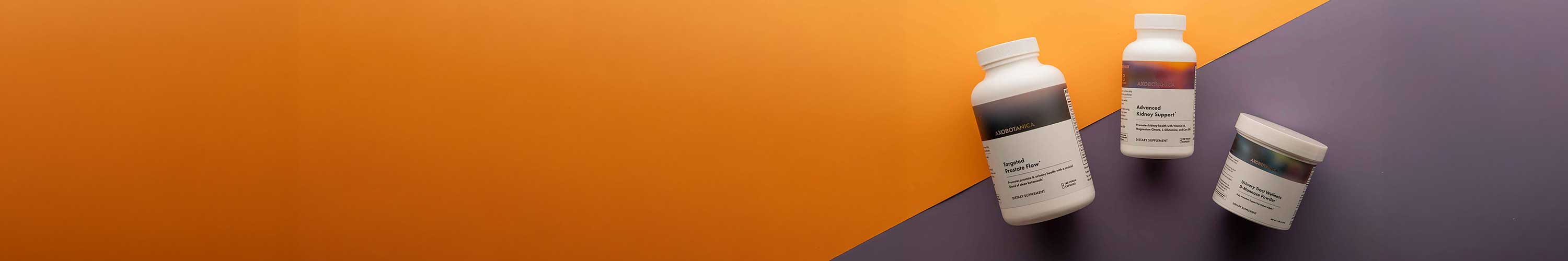 Three supplement bottles on a gradient orange to purple background
