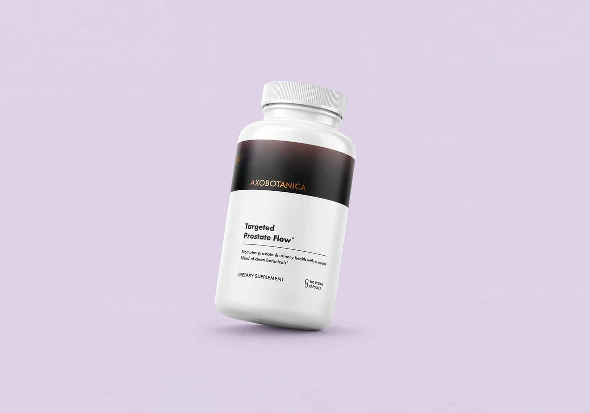 A bottle of Targeted Prostate Flow dietary supplement, shown at a three-quarter angle on a solid light lavender background.