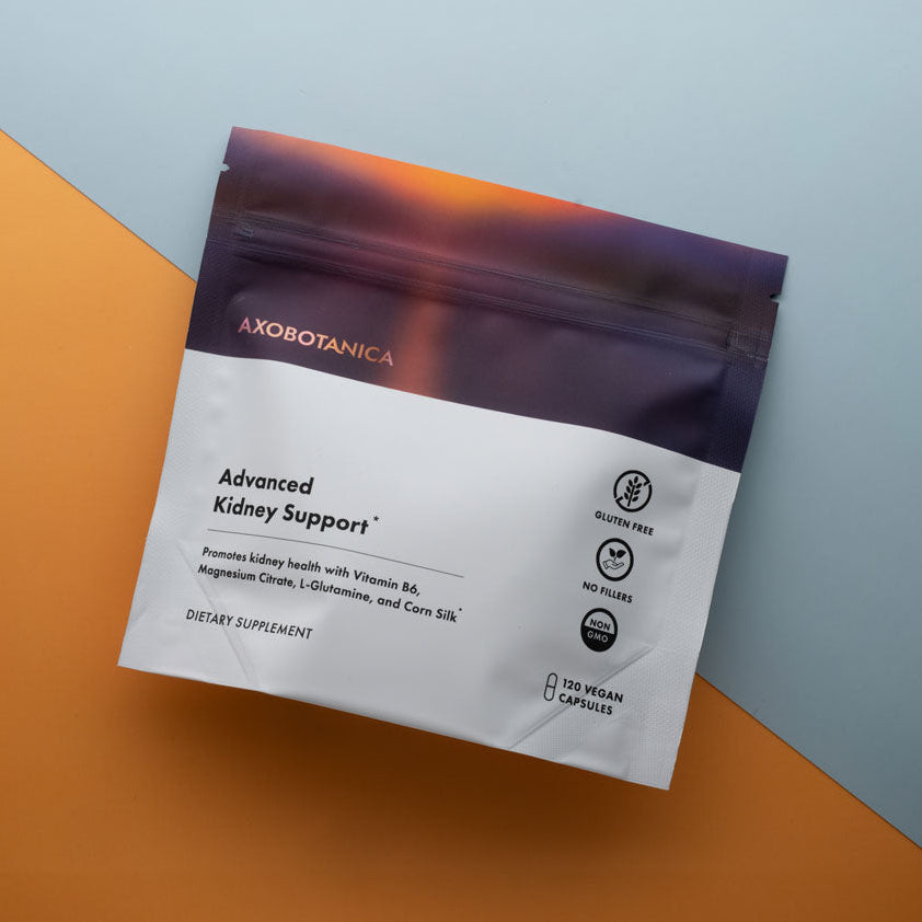 Axobotanica Advanced Kidney Support supplement package on a colorful background