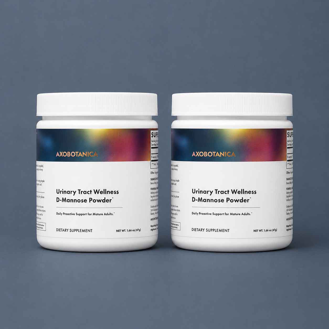 Two white jars of AXOBOTANICA Urinary Tract Wellness D-Mannose Powder against a slate blue-gray background.