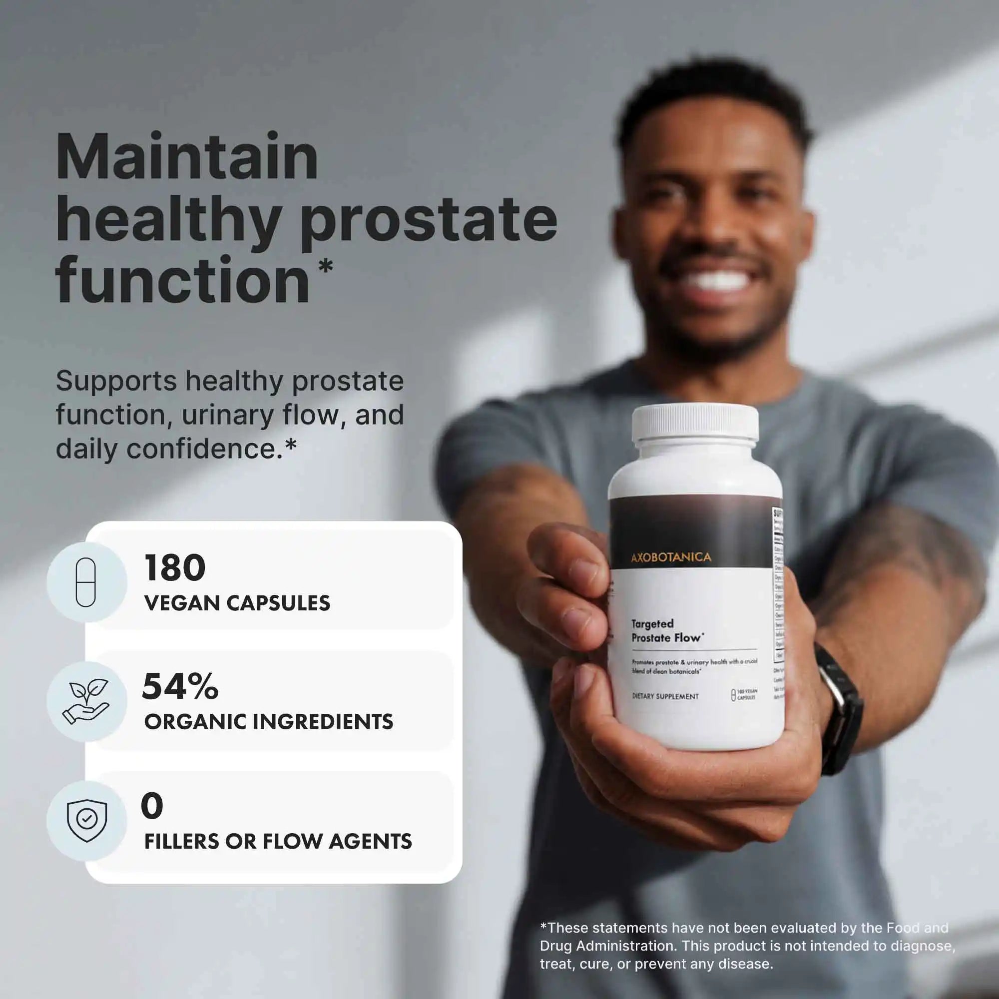 Man holding supplement bottle