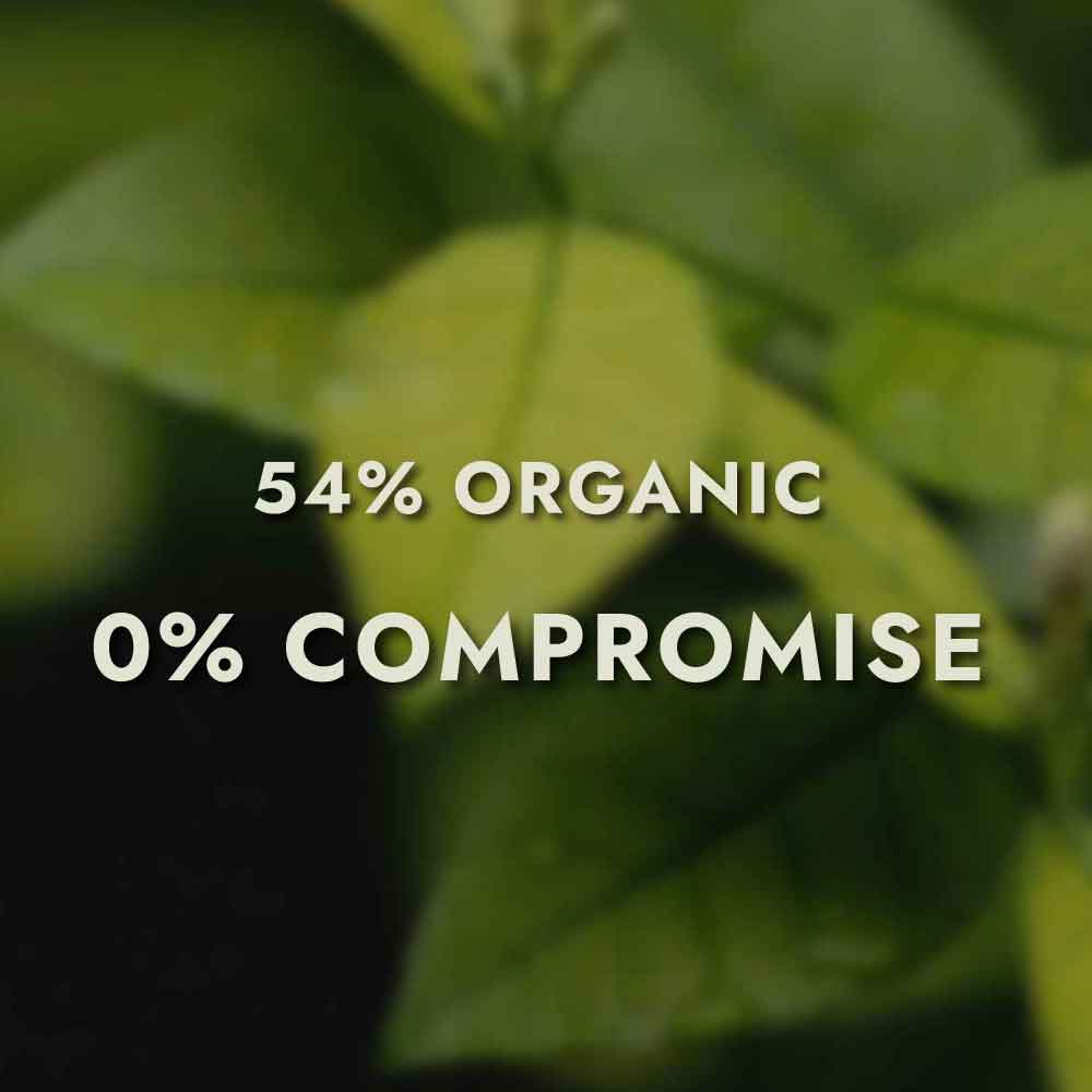 Image of green leaves with text, "54% Organic, 0% Compromise."